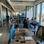 03 european open plan office meetings collaboration daytime - Enhetsregisteret vs Foretaksregisteret – hva er forskjellen?