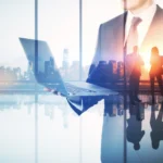 Abstract image of businessman using laptop in mode 2026 01 11 08 33 52 utc - Støtteordninger for bedrifter: tilskudd, lån og garantier