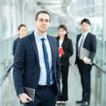 Businessman and his business team 2026 01 11 09 14 19 utc - Hvordan følge opp nye kontakter etter et møte: Timing og kanaler