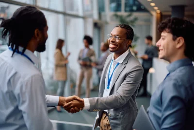 Happy black businessman shaking hands with his col 2026 01 09 10 34 53 utc - Konflikter i relasjoner