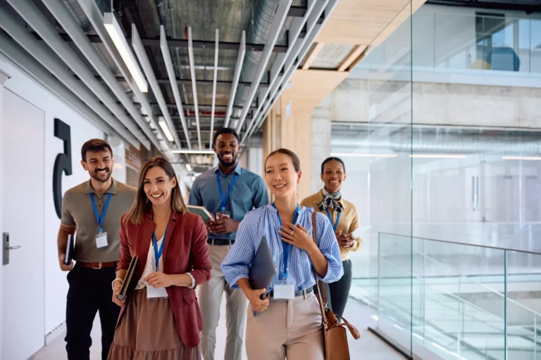 Multiracial business team going on a meeting in th 2026 01 08 08 11 37 utc - Teknisk guide: Integrasjoner for møtebooking med CRM, kalender...