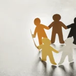 Paper people holding hands on light background un 2026 02 05 19 37 59 utc - Uenighet på jobb: slik håndterer du spenninger før de blir konfl...