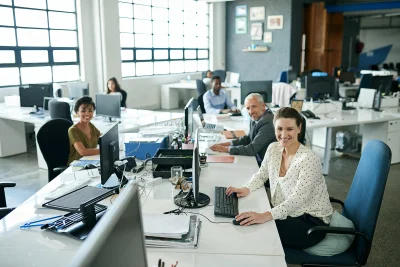 Portrait of a group of coworkers sitting at their 2026 01 09 10 03 50 utc - CRM-implementering: steg-for-steg guide til migrering og opplæri...