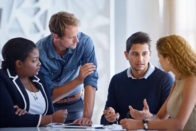 Shot of a group of colleagues working together in 2026 01 09 09 24 14 utc - Teknologivalg for tverrbedrifts-samarbeid: skybasert ERP og inte...