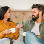 Young hindu couple chatting over coffee at home s 2026 01 08 23 06 24 utc - Kommunikasjon som styrker samarbeid og gode relasjoner
